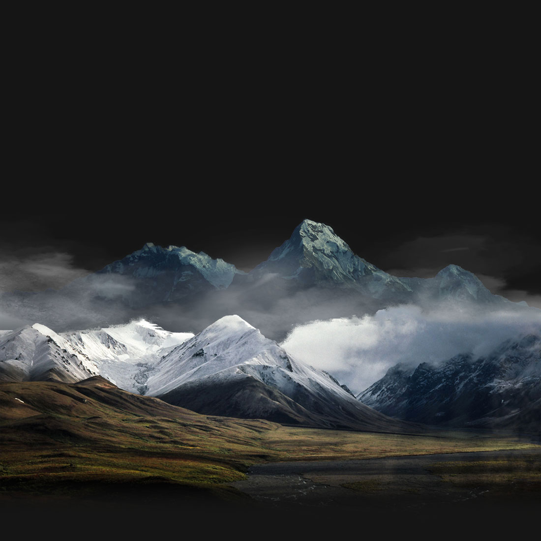 Grand landscape image with rolling hills and snowcapped mountains